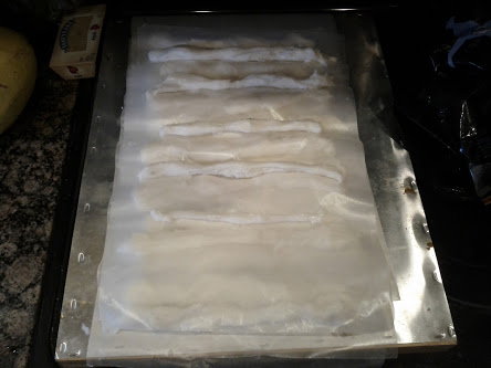 Fondant prepped on a tray with wax paper ready to head out to the hives